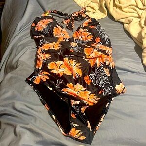 Brand new never worn bathing suit I got it, but it didn’t fit